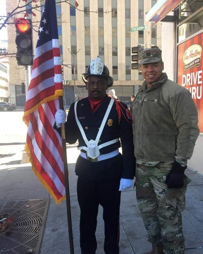 Keontra Campbell and his father in law during a the 2018 Veterans Day Parade